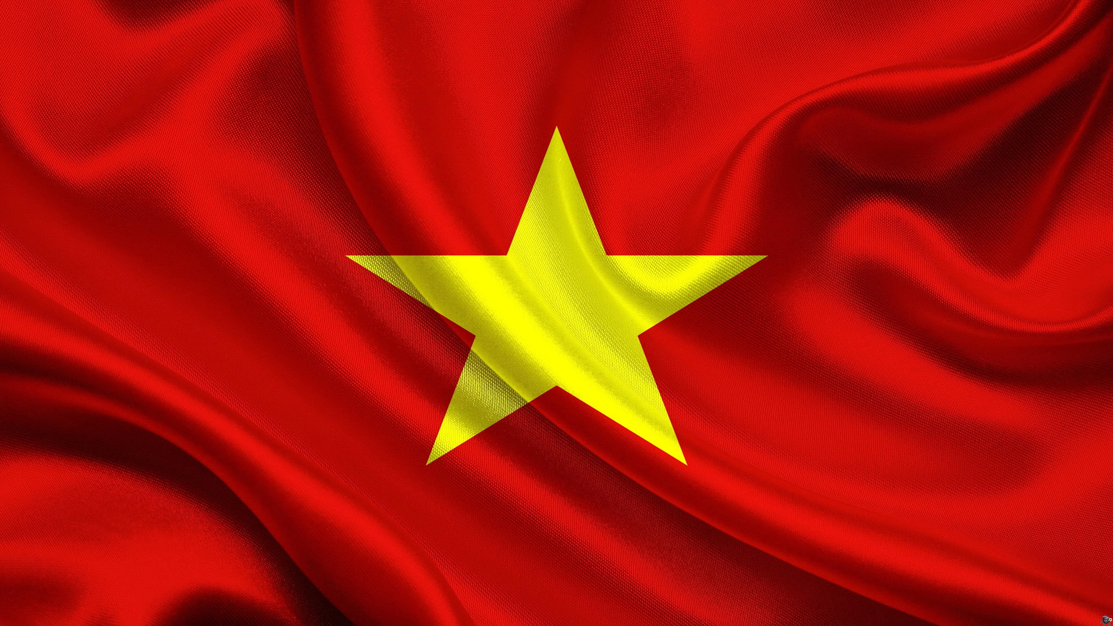 Ảnh lá cờ Việt Nam màu đỏ với ngôi sao vàng tung bay trong các nếp vải